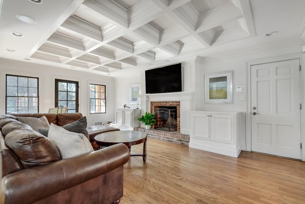 1846 Angelique Drive Decatur, GA 30033 - Photo 13 of 45 a living room with furniture a fireplace and a flat screen tv