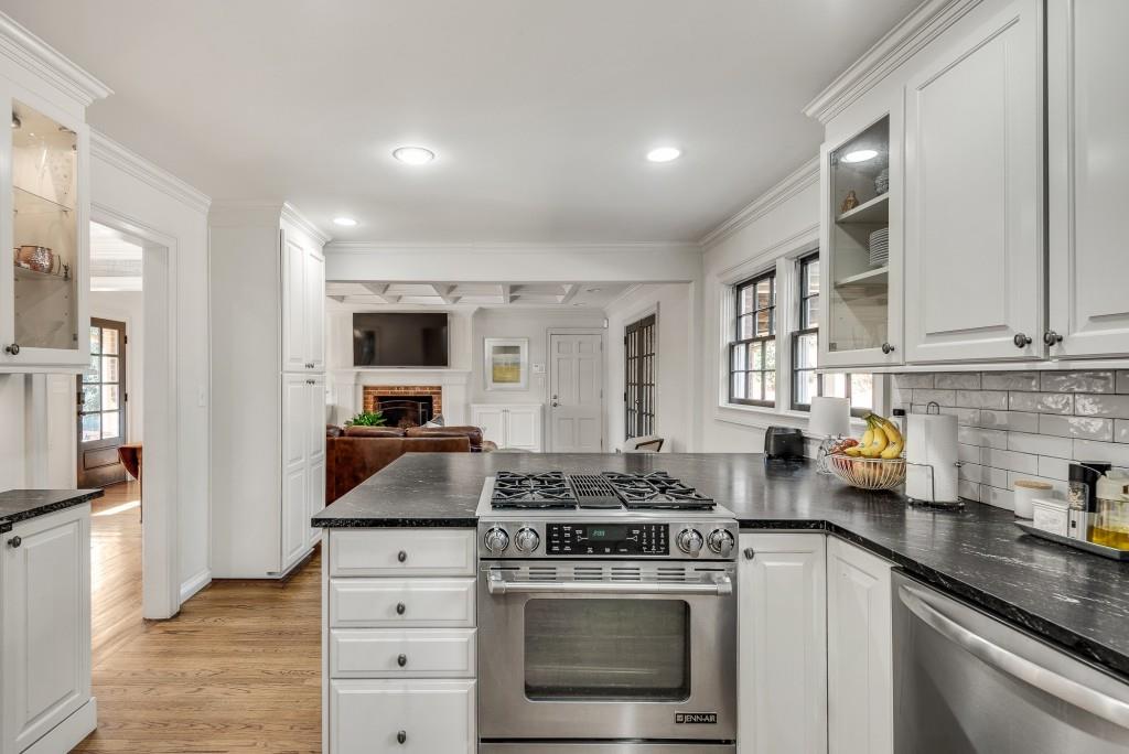 1846 Angelique Drive Decatur, GA 30033 - Photo 17 of 45 a kitchen with stainless steel appliances granite countertop a stove and a sink