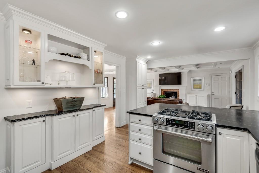 1846 Angelique Drive Decatur, GA 30033 - Photo 18 of 45 a kitchen with granite countertop a sink cabinets and stainless steel appliances