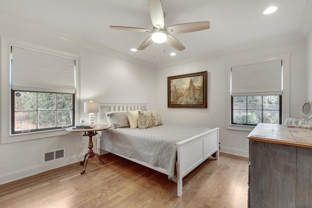 1846 Angelique Drive Decatur, GA 30033 - Photo 19 of 45 a bedroom with a bed and a desk