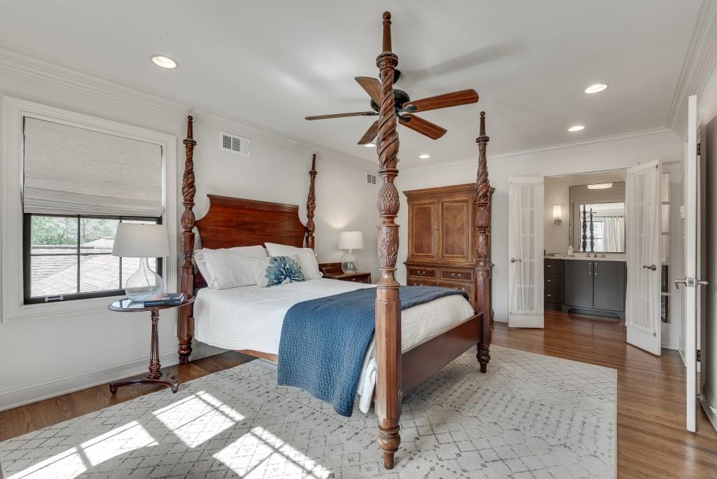 1846 Angelique Drive Decatur, GA 30033 - Photo 22 of 45 a bedroom with a bed and a chandelier