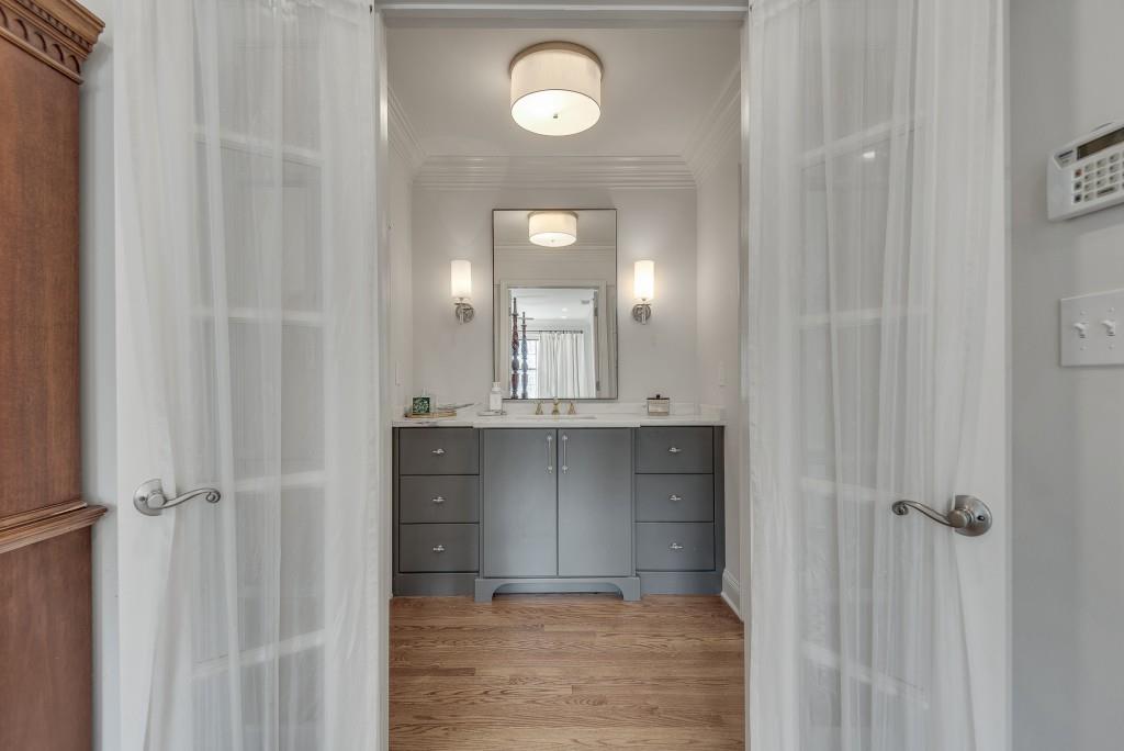 1846 Angelique Drive Decatur, GA 30033 - Photo 23 of 45 a bathroom with a sink and a mirror