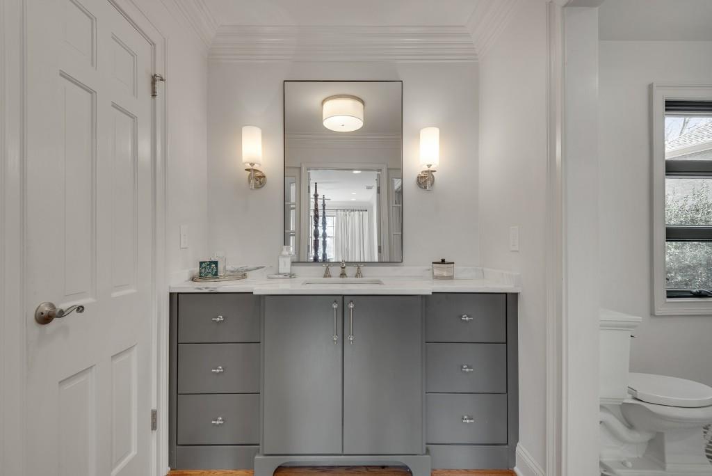 1846 Angelique Drive Decatur, GA 30033 - Photo 24 of 45 a bathroom with a double vanity sink and a mirror