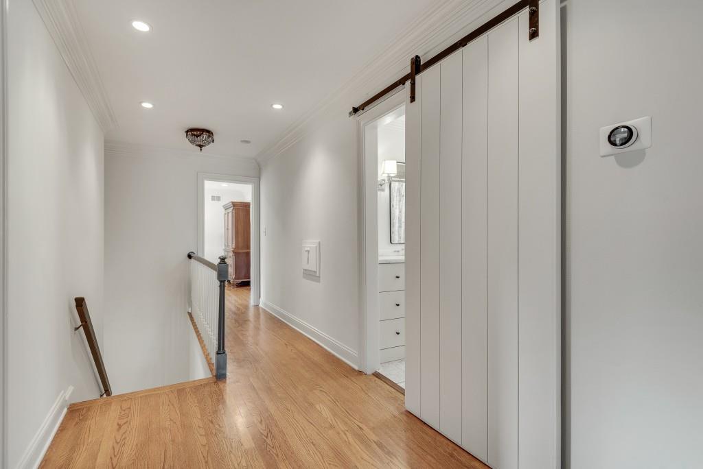 1846 Angelique Drive Decatur, GA 30033 - Photo 26 of 45 a view of hallway with furniture and wooden floor