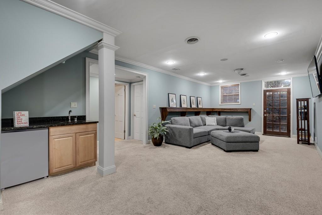 1846 Angelique Drive Decatur, GA 30033 - Photo 32 of 45 a living room with furniture and kitchen view