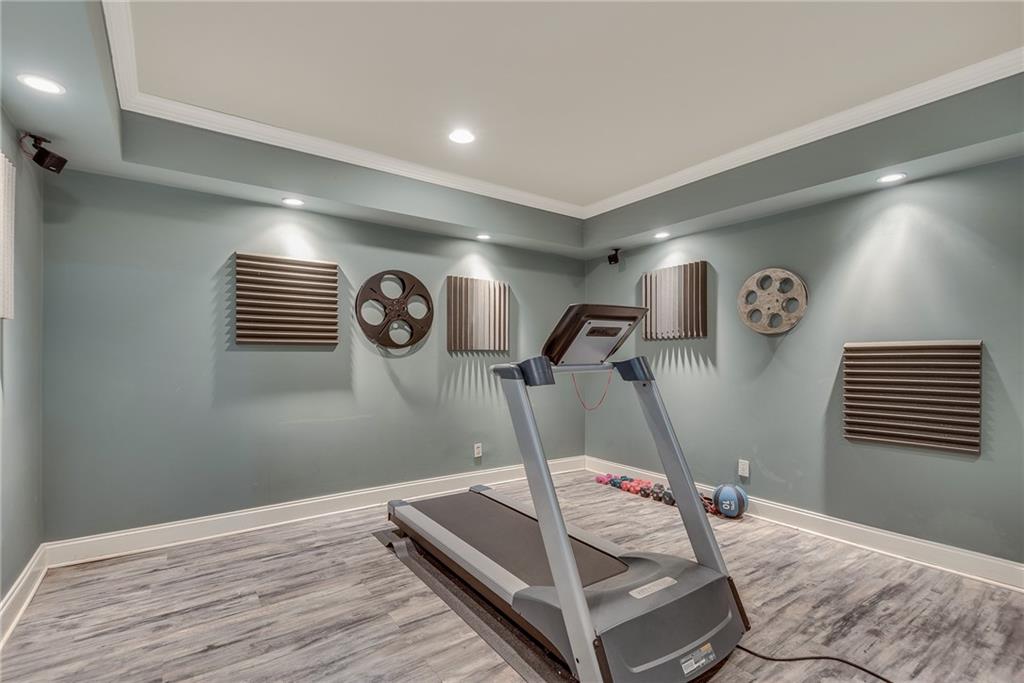 1846 Angelique Drive Decatur, GA 30033 - Photo 34 of 45 a bedroom with a bed and a chandelier