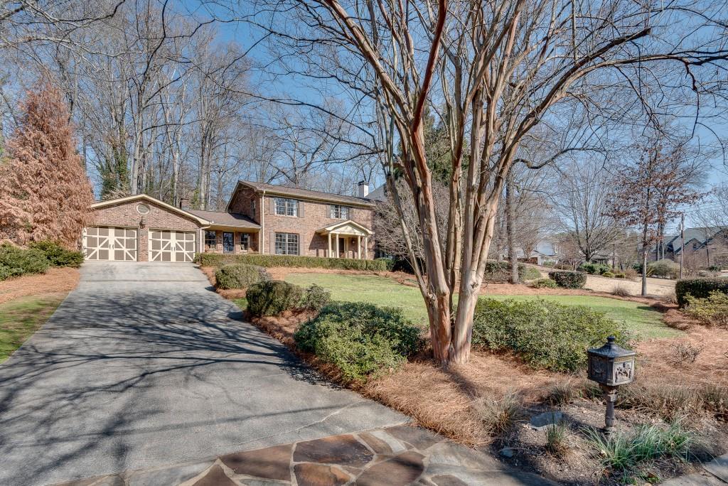 1846 Angelique Drive Decatur, GA 30033 - Photo 41 of 45 a front view of a house with garden