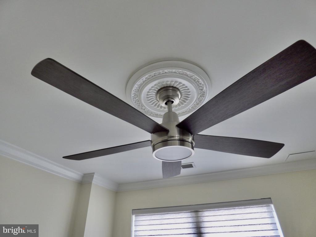 11800 Sunset Hills Road, Unit 118 Reston, VA 20190 - Photo 22 of 52 Sleek ceiling fan for modern comfort.