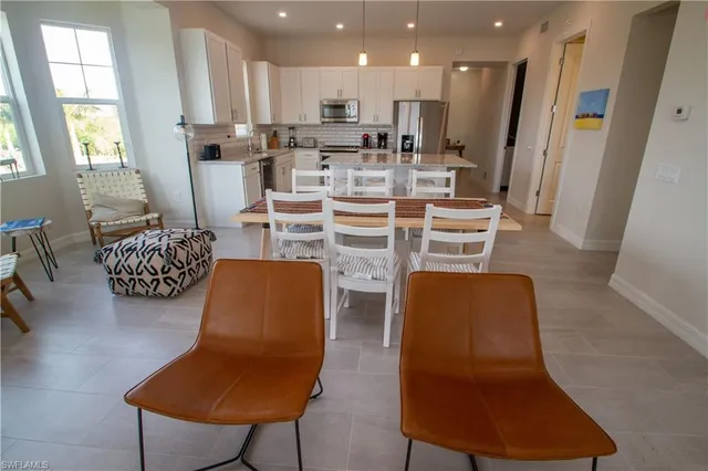 a living room with furniture and a table