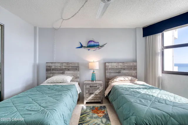 a bathroom with a sink vanity and a mirror