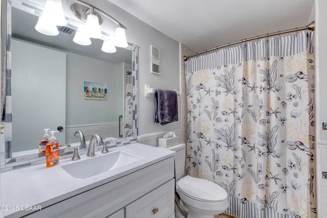 a view of a city skyline from a balcony