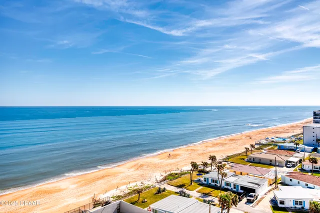 a view of a balcony with an ocean view