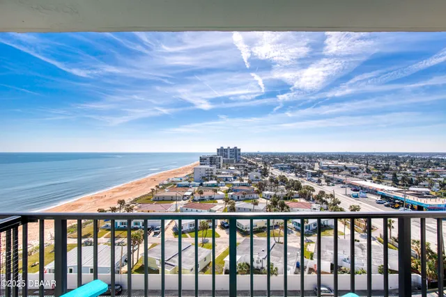 a view of a swimming pool with a lounge chair
