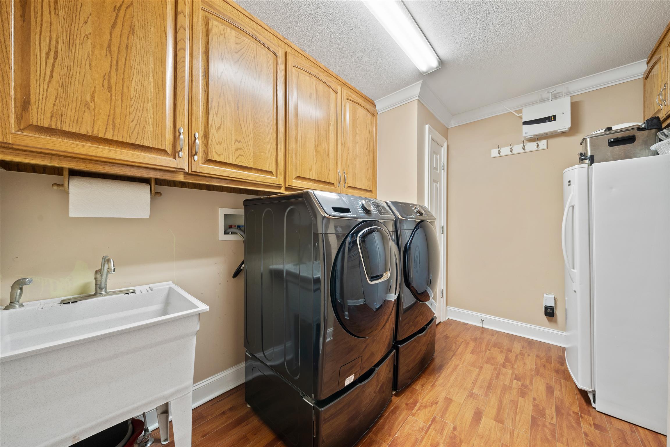 6977 Woodruff Tolleson Road Adams, TN 37010 - Photo 14 of 27 a utility room with dryer and washer