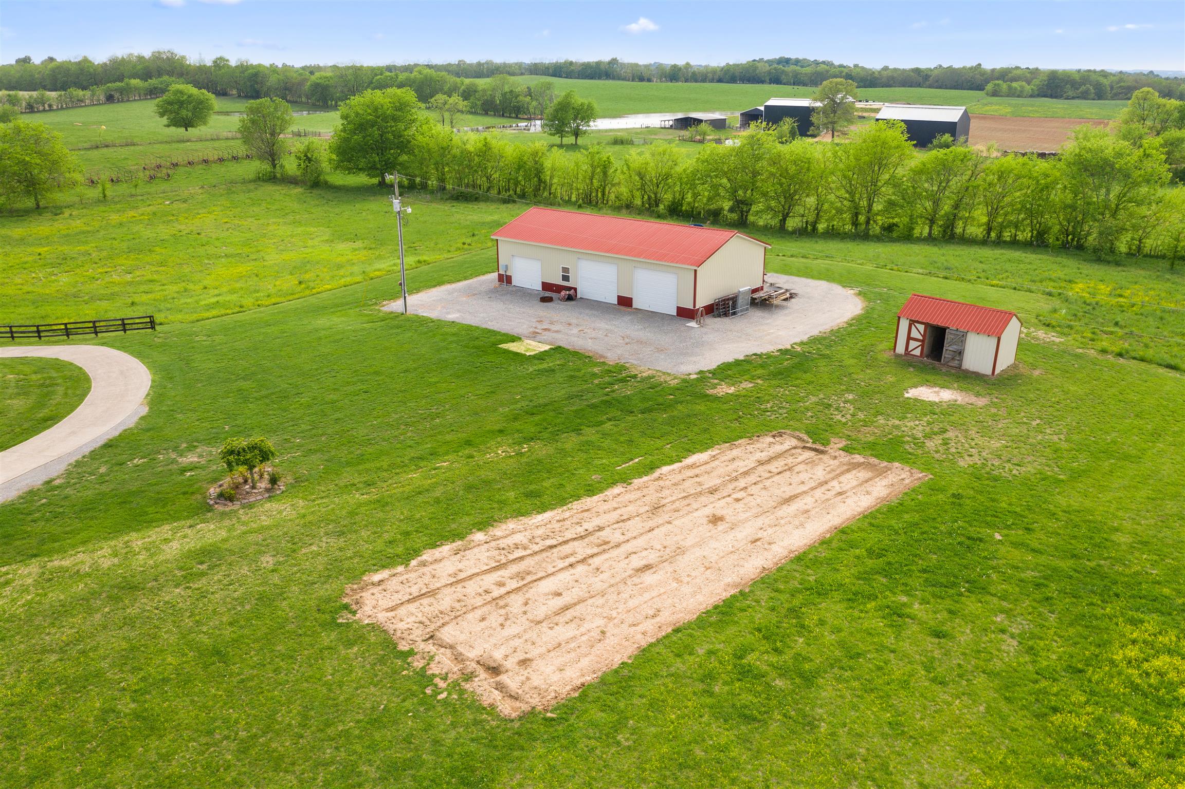 6977 Woodruff Tolleson Road Adams, TN 37010 - Photo 23 of 27 a view of a garden with an outdoor space
