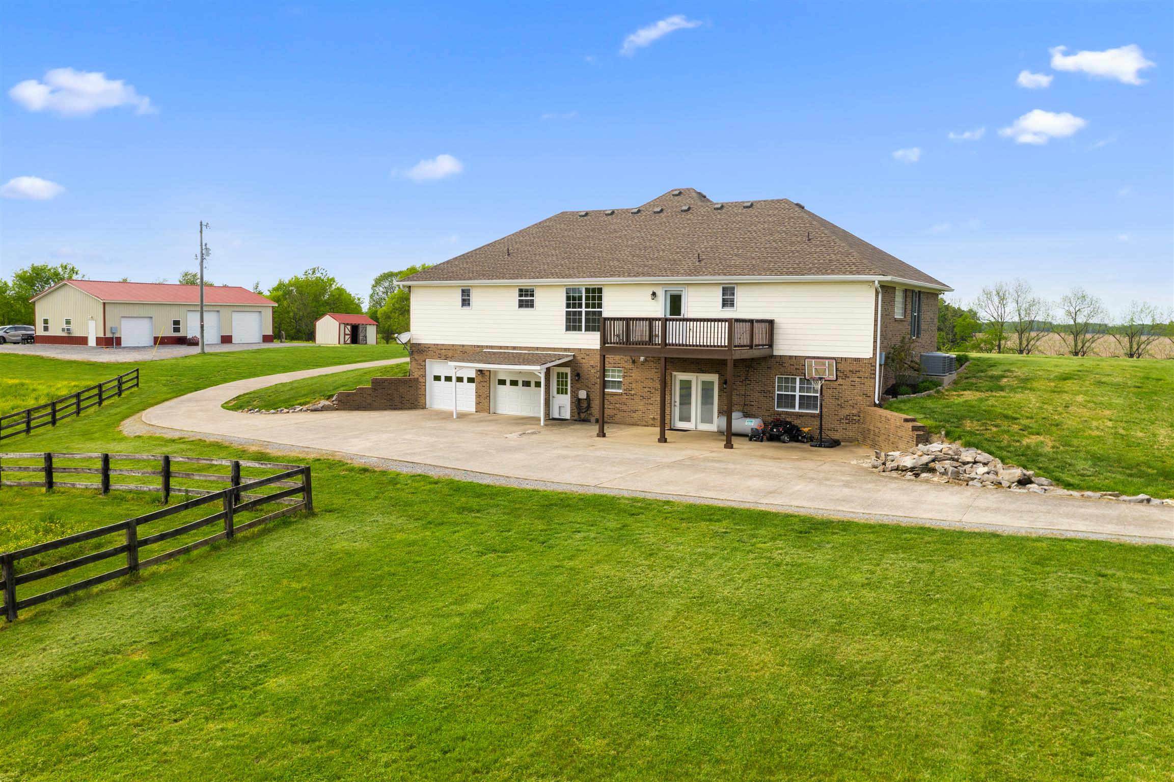6977 Woodruff Tolleson Road Adams, TN 37010 - Photo 24 of 27 a view of a house with backyard and sitting area