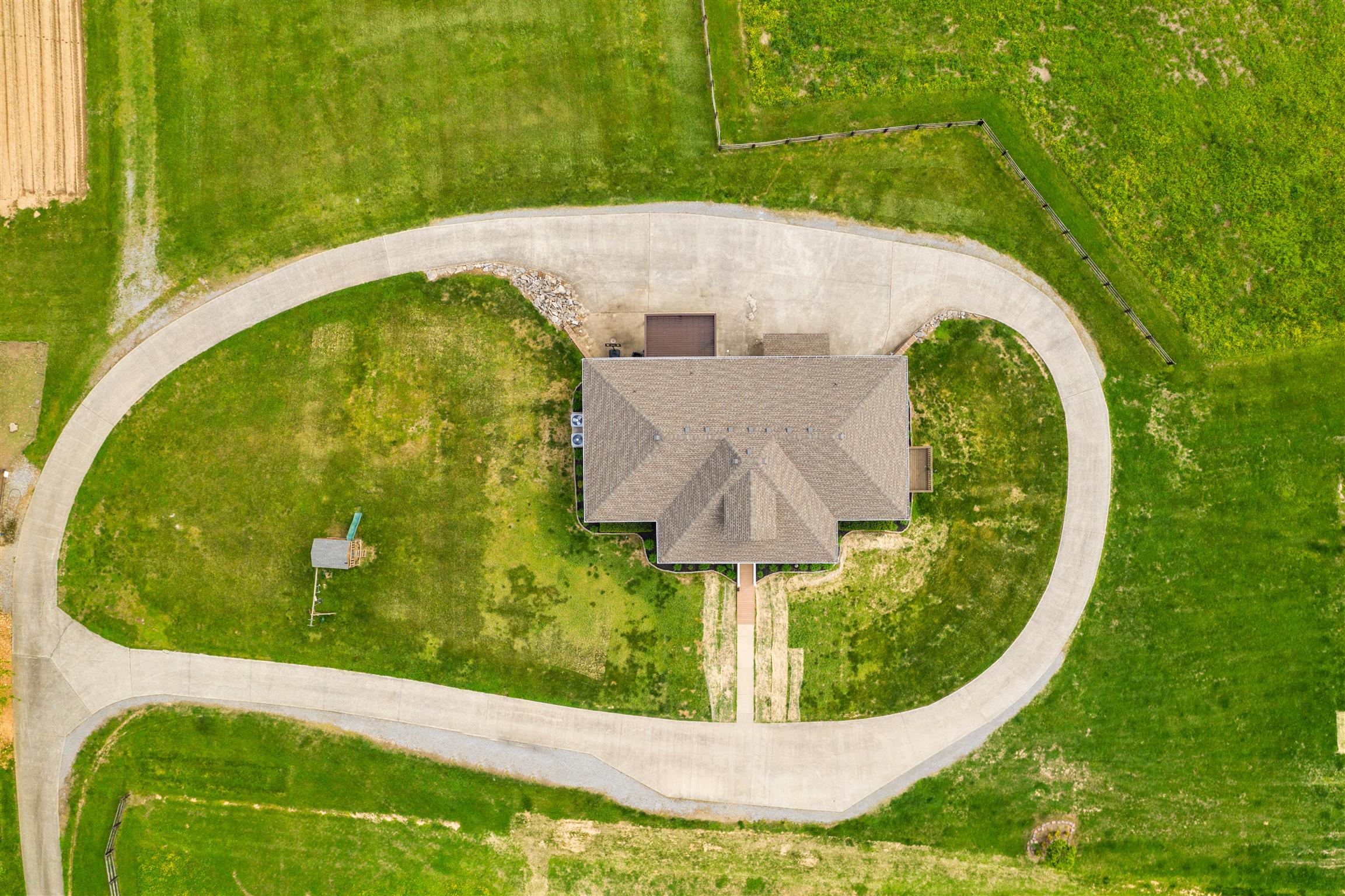 6977 Woodruff Tolleson Road Adams, TN 37010 - Photo 25 of 27 a view of a swimming pool with a yard