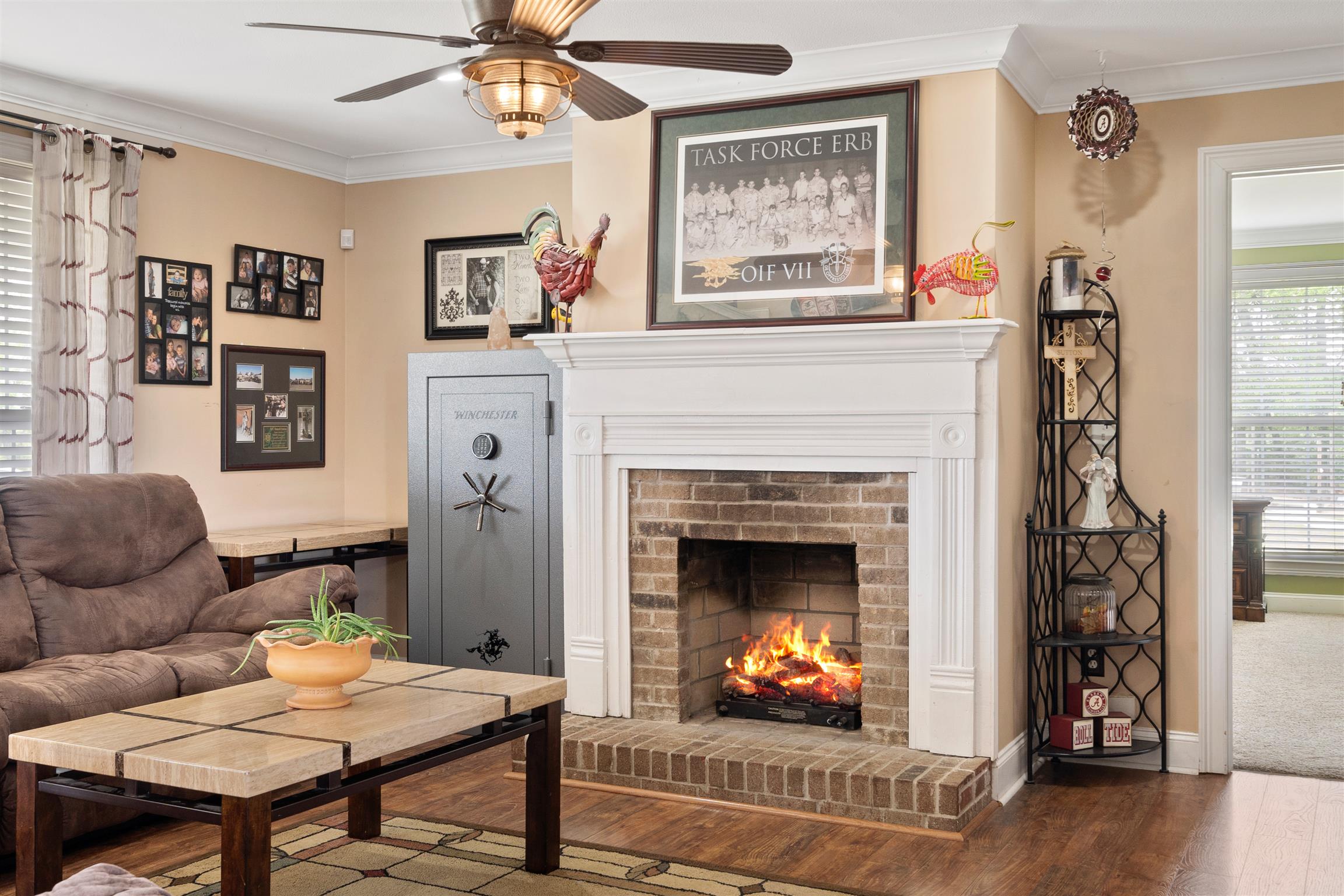 6977 Woodruff Tolleson Road Adams, TN 37010 - Photo 5 of 27 a living room with furniture and a fireplace