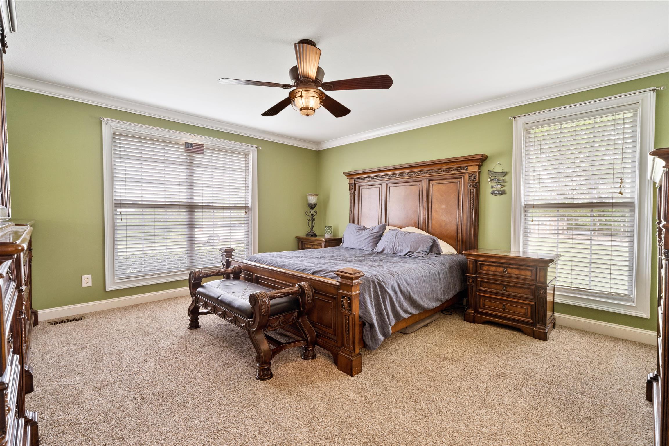 6977 Woodruff Tolleson Road Adams, TN 37010 - Photo 10 of 27 a spacious bedroom with a bed and a large window