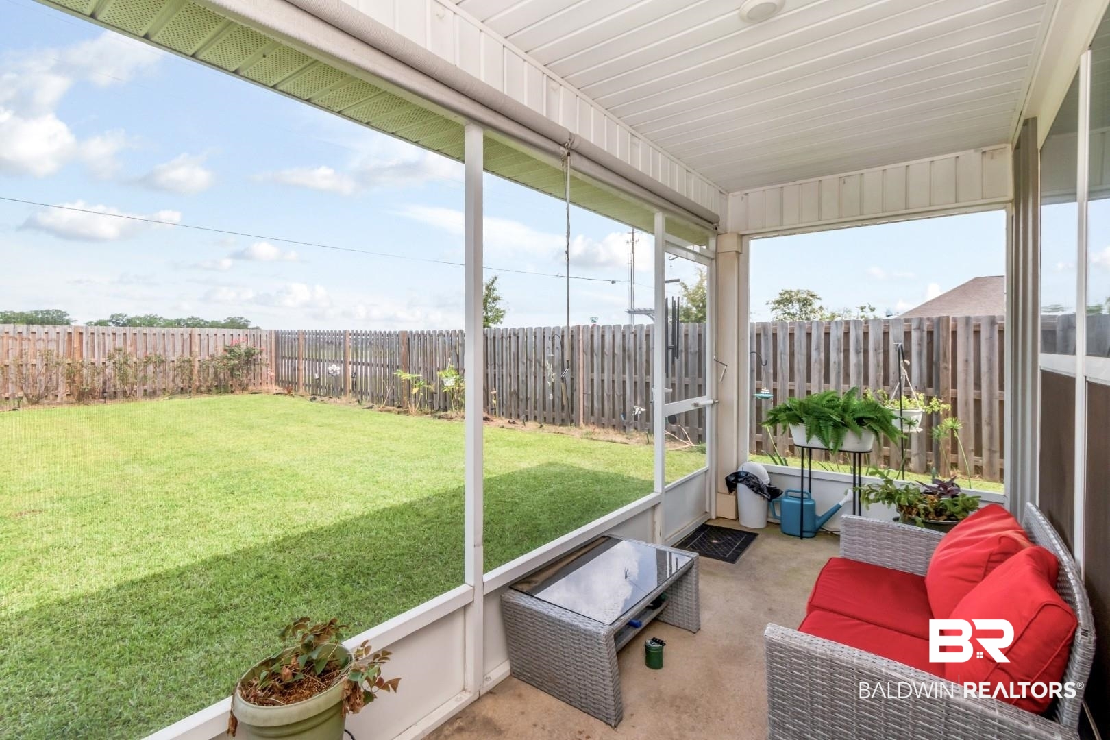 1295 Hayward Loop Foley, AL 36535 - Photo 23 of 29 Screened-in porch featuring a concrete slab floor and a white paneled ceiling