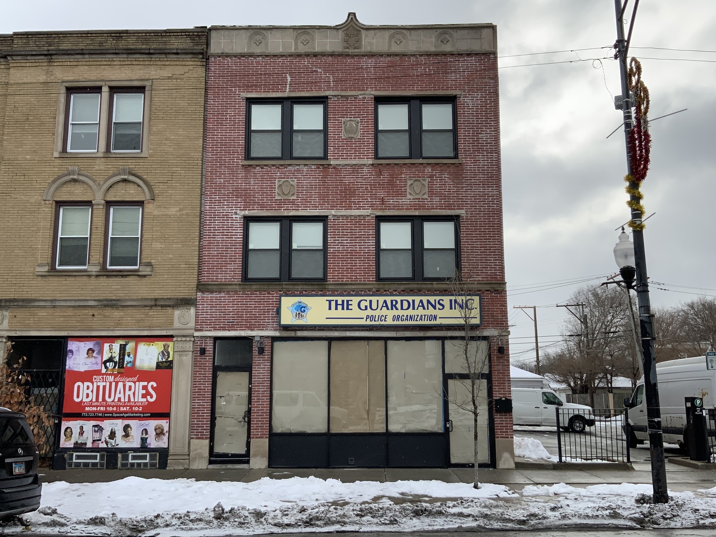 a view of a brick building with many windows
