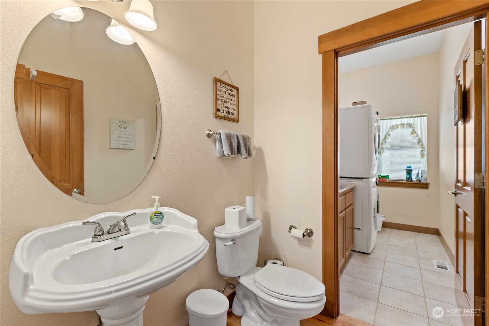 6605 Stringtown Road East Eatonville, WA 98328 - Photo 17 of 40 a bathroom with a sink a toilet and shower a mirror