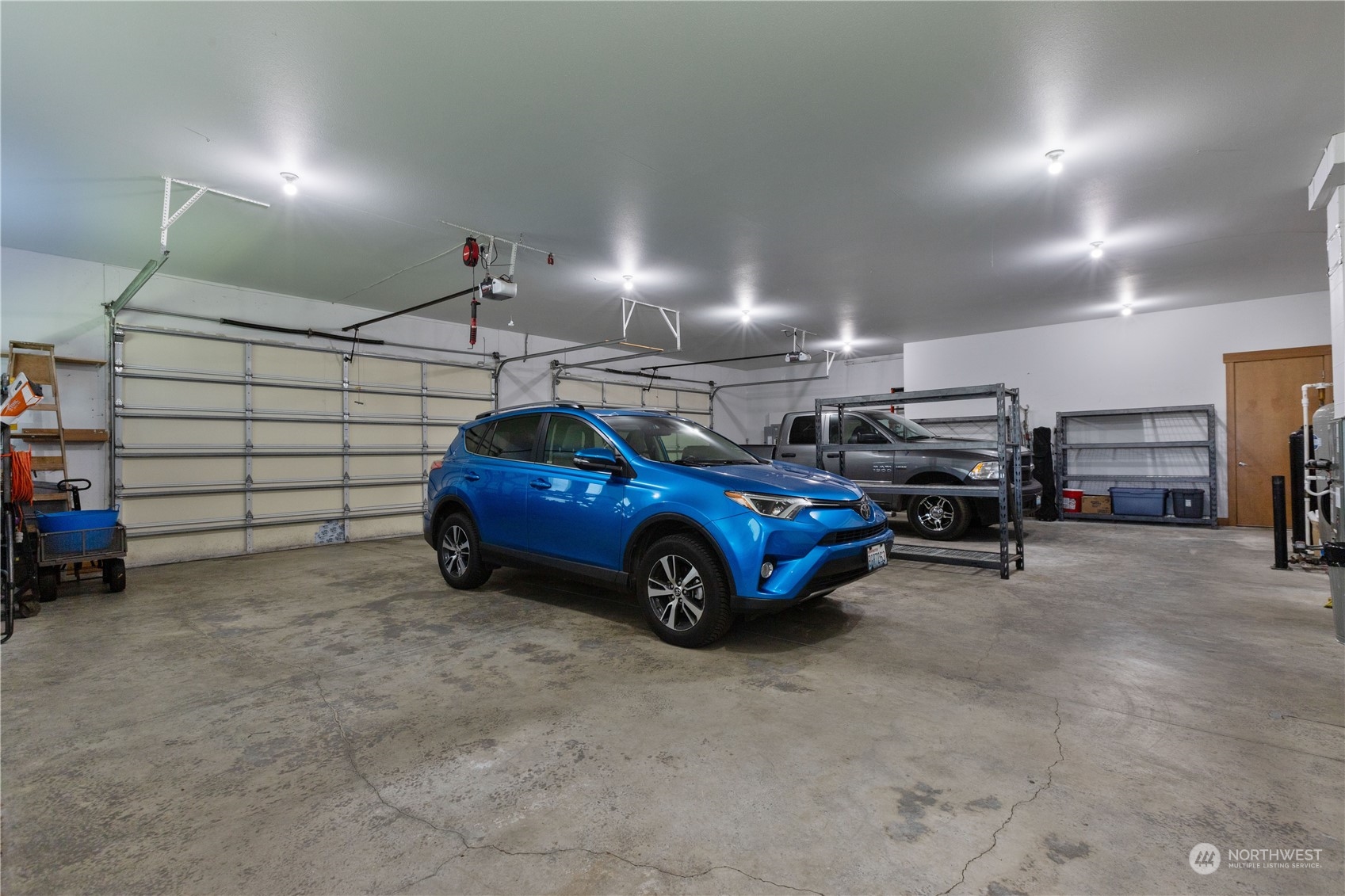 6605 Stringtown Road East Eatonville, WA 98328 - Photo 22 of 40 a view of parking garage with cars