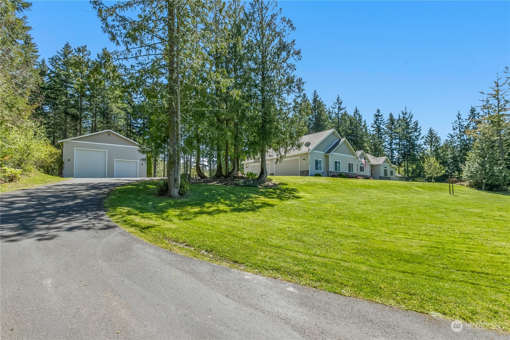 6605 Stringtown Road East Eatonville, WA 98328 - Photo 31 of 40 a view of a house with a yard