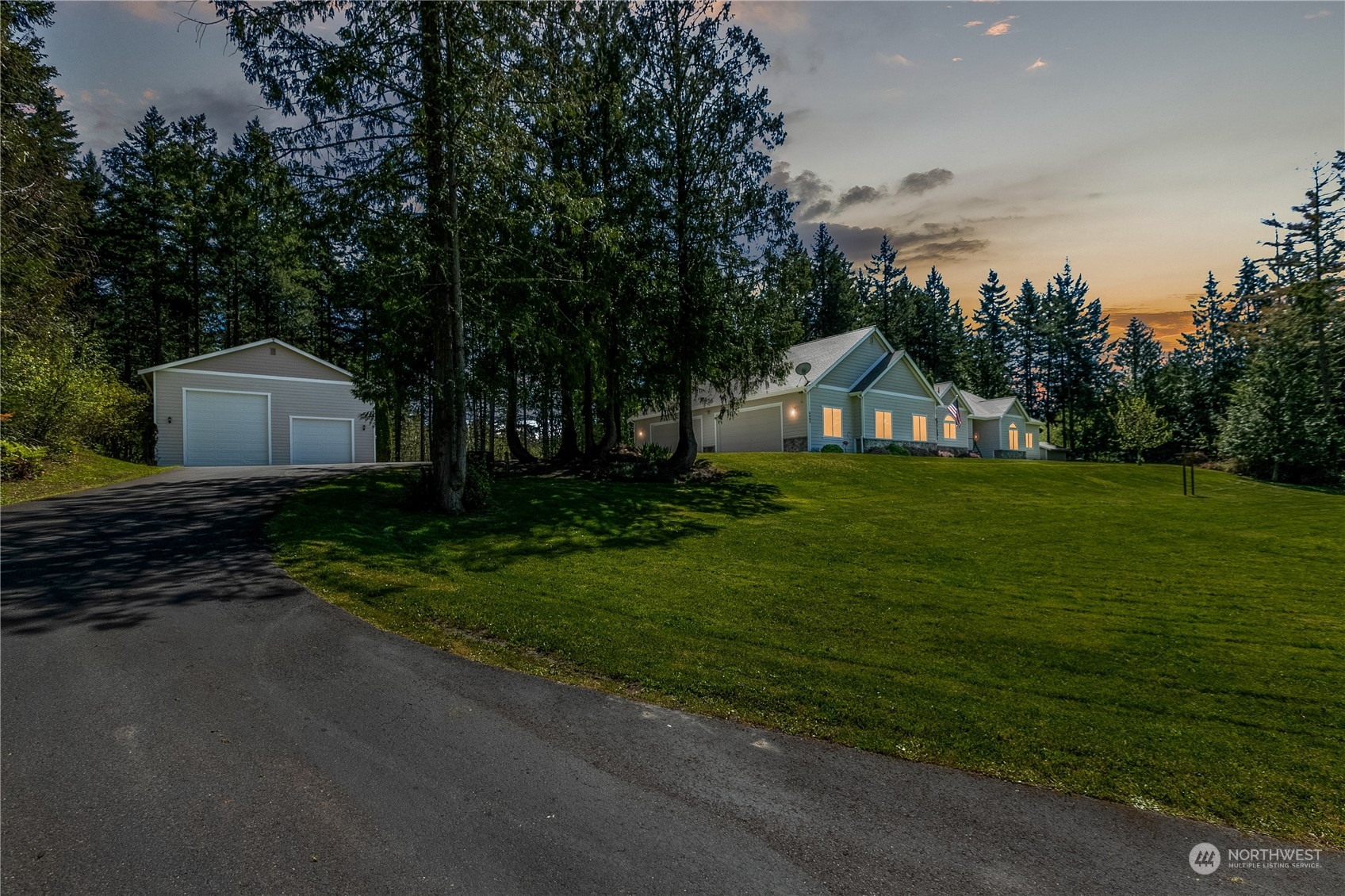 6605 Stringtown Road East Eatonville, WA 98328 - Photo 32 of 40 a house view with a garden space