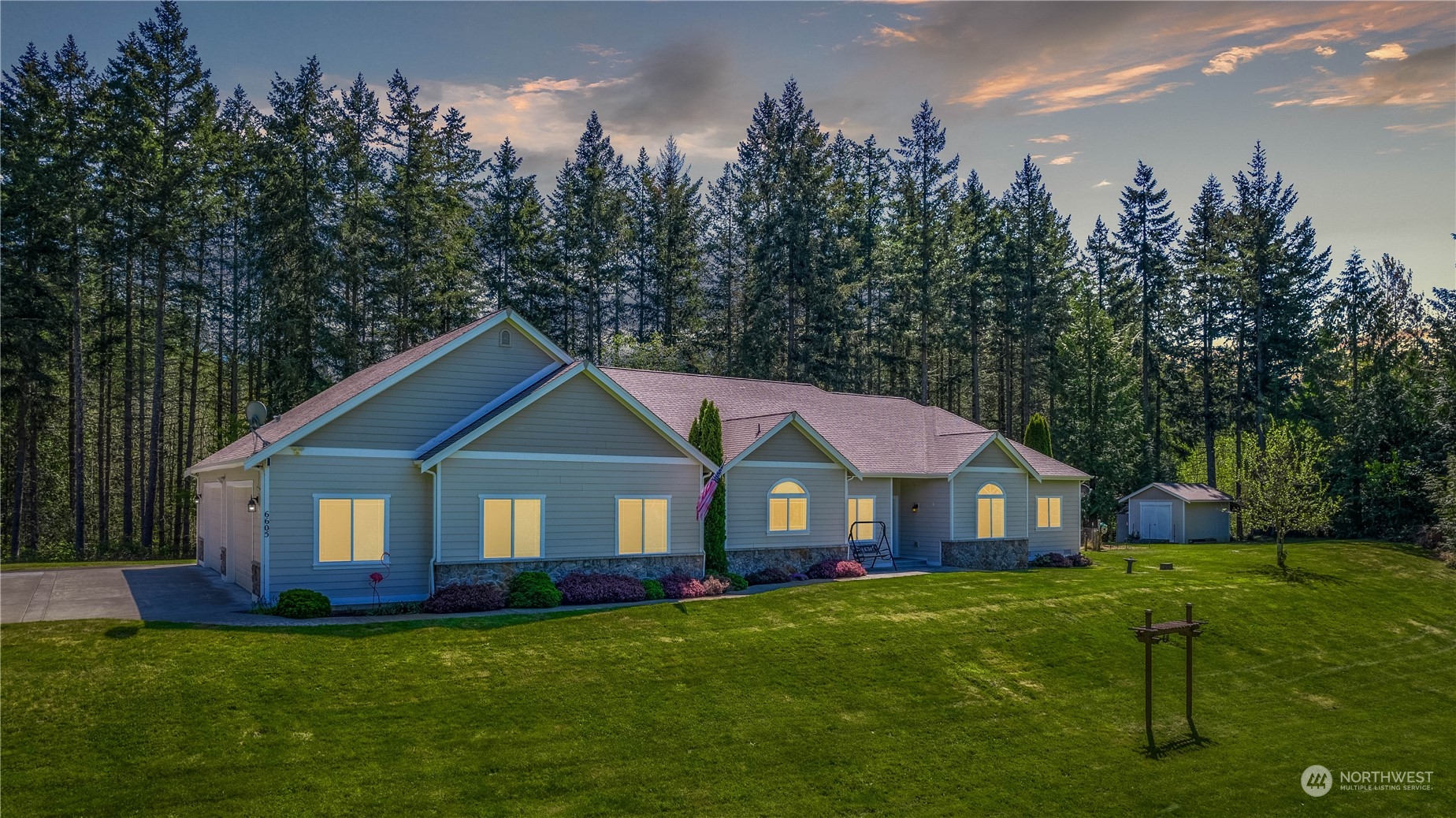 6605 Stringtown Road East Eatonville, WA 98328 - Photo 39 of 40 a view of a house with a yard