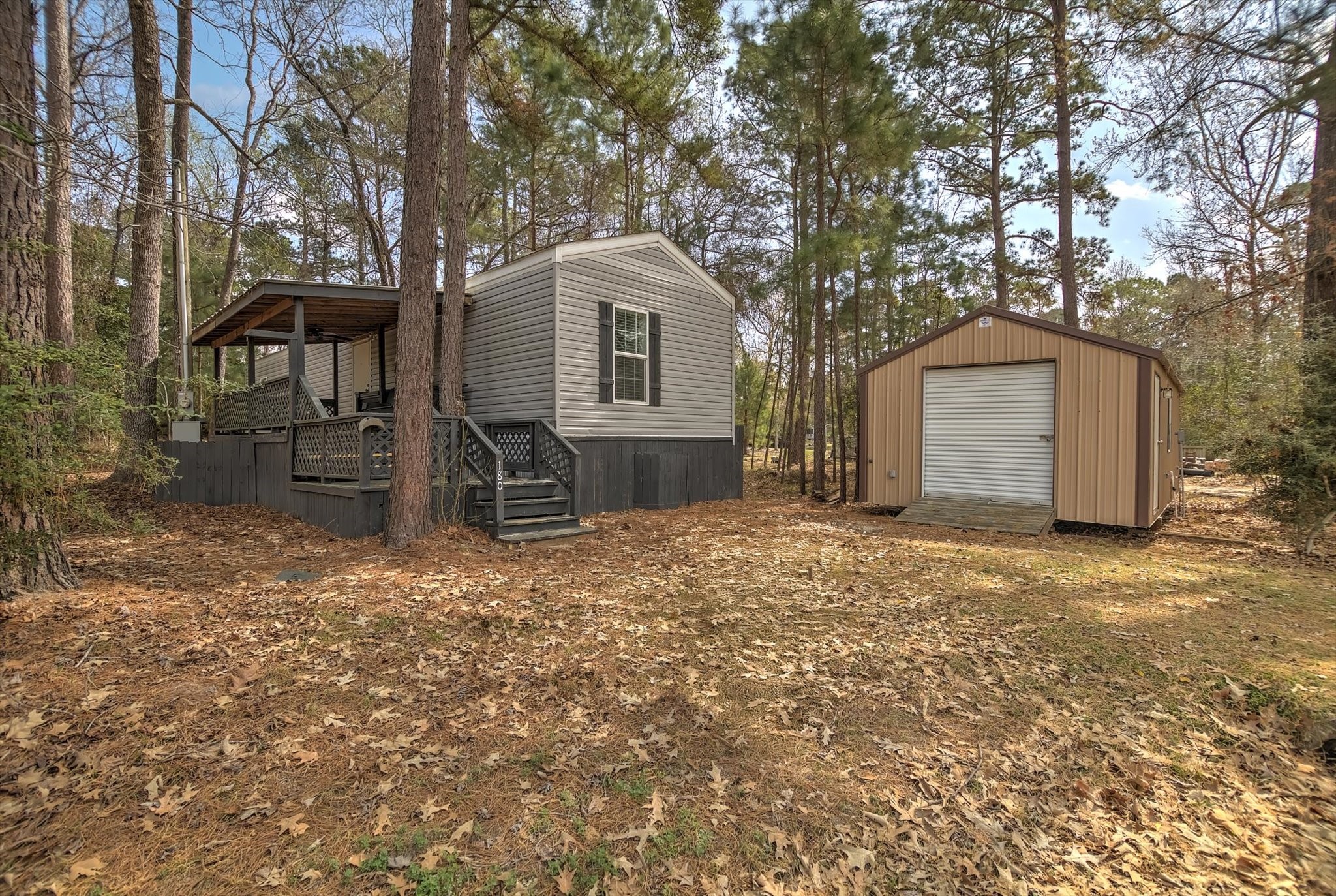 180 Elm Trail Trinity, TX 75862 - Photo 2 of 44 home and shed - Shed has electricity and water installed.