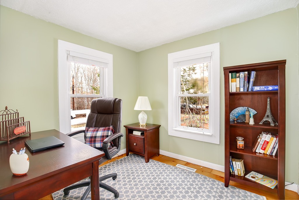 4 Acanthis Road Billerica, MA 01821 - Photo 8 of 12 a view of a workspace with furniture and a window