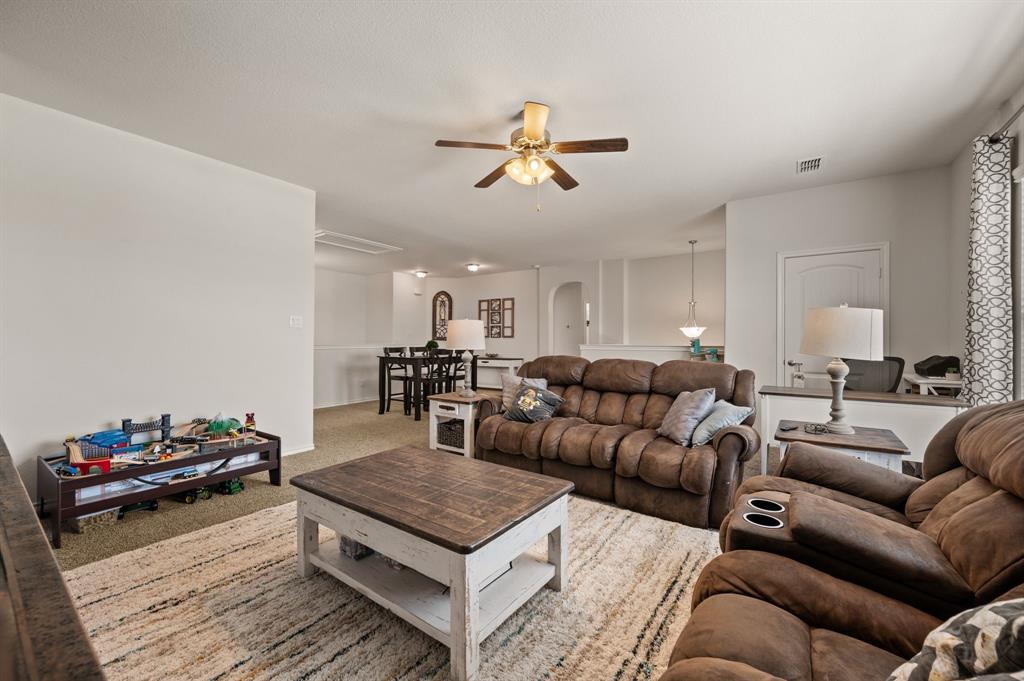 15817 White Mill Road Fort Worth, TX 76177 - Photo 15 of 27 a living room with furniture a air conditioner and a window
