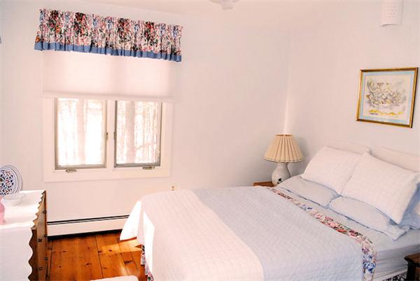 374 Old Montague Road Amherst, MA 01002 - Photo 15 of 30 a bedroom with a bed and a window