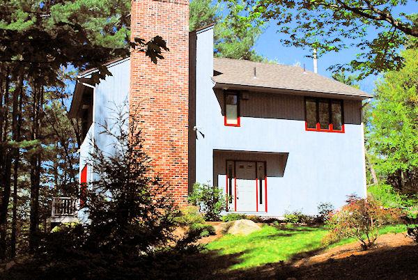 374 Old Montague Road Amherst, MA 01002 - Photo 25 of 30 a view of a house with a small yard and large tree