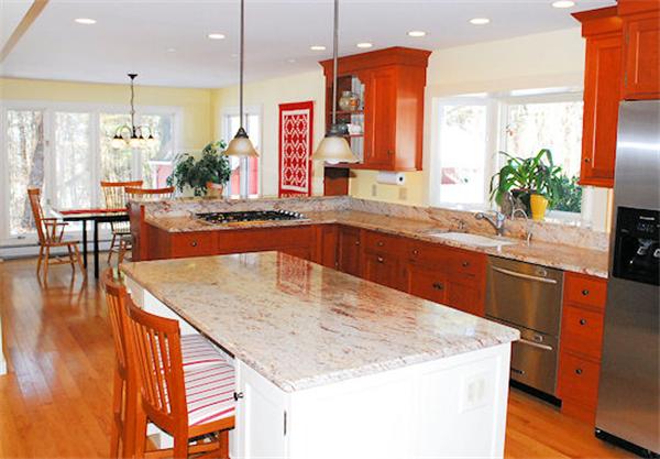 374 Old Montague Road Amherst, MA 01002 - Photo 8 of 30 a kitchen with center island table and chairs in it