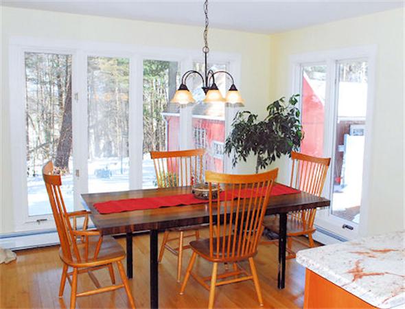 374 Old Montague Road Amherst, MA 01002 - Photo 9 of 30 a dining room filled with furniture and window