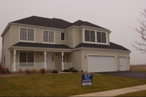 251 Swanson Road Sycamore, IL 60178 - Photo 1 of 1 a front view of a house with a yard