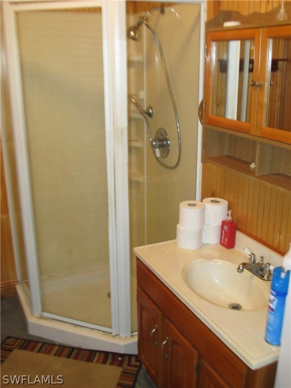 15850 Old Olga Road Alva, FL 33920 - Photo 11 of 11 a bathroom with a sink and a mirror