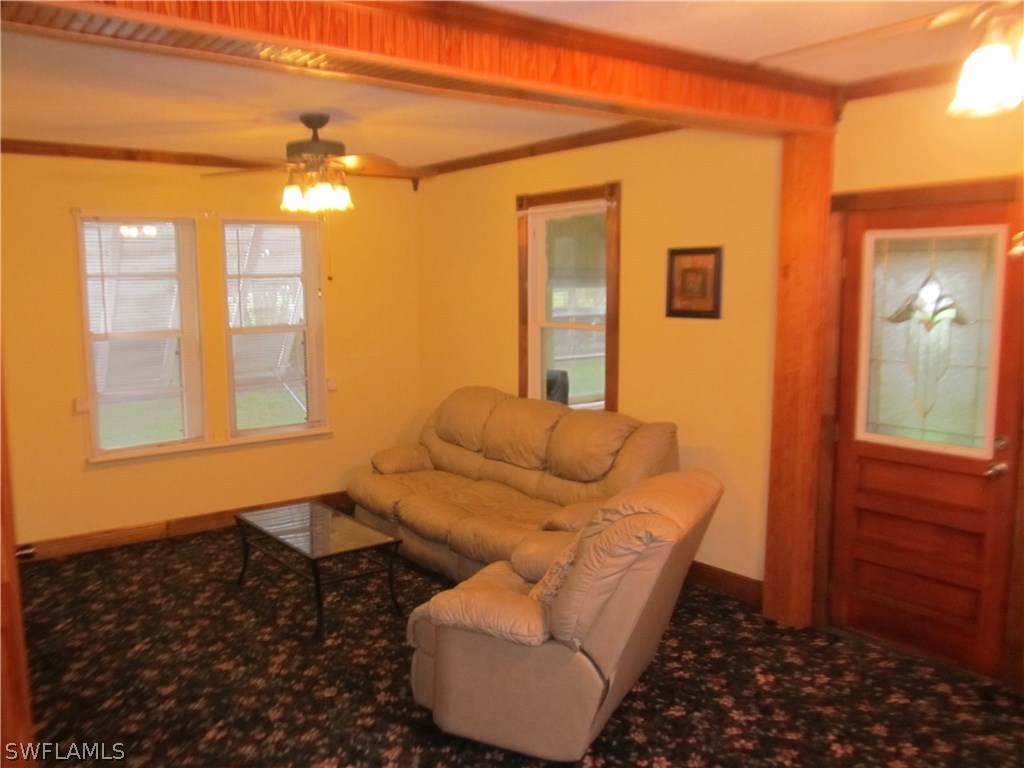 15850 Old Olga Road Alva, FL 33920 - Photo 5 of 11 a living room with furniture and a window