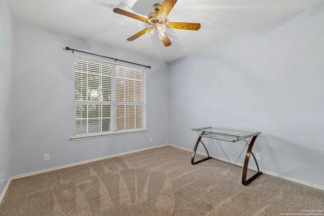 a view of a livingroom with a workspace