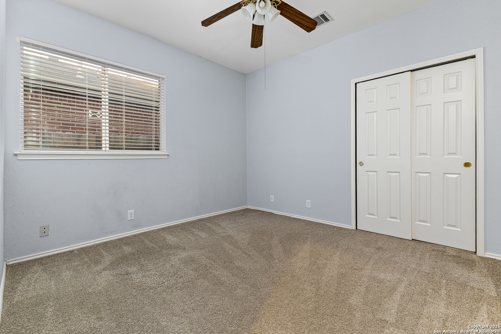 8522 Sonora Pass Helotes, TX 78023 - Photo 17 of 27 an empty room with a window