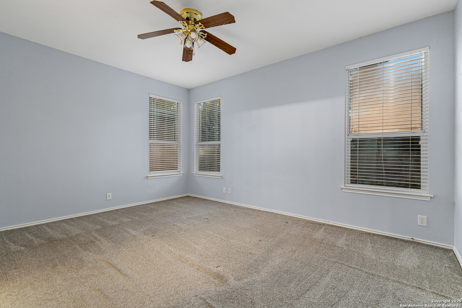 8522 Sonora Pass Helotes, TX 78023 - Photo 19 of 27 a view of an empty room with a window