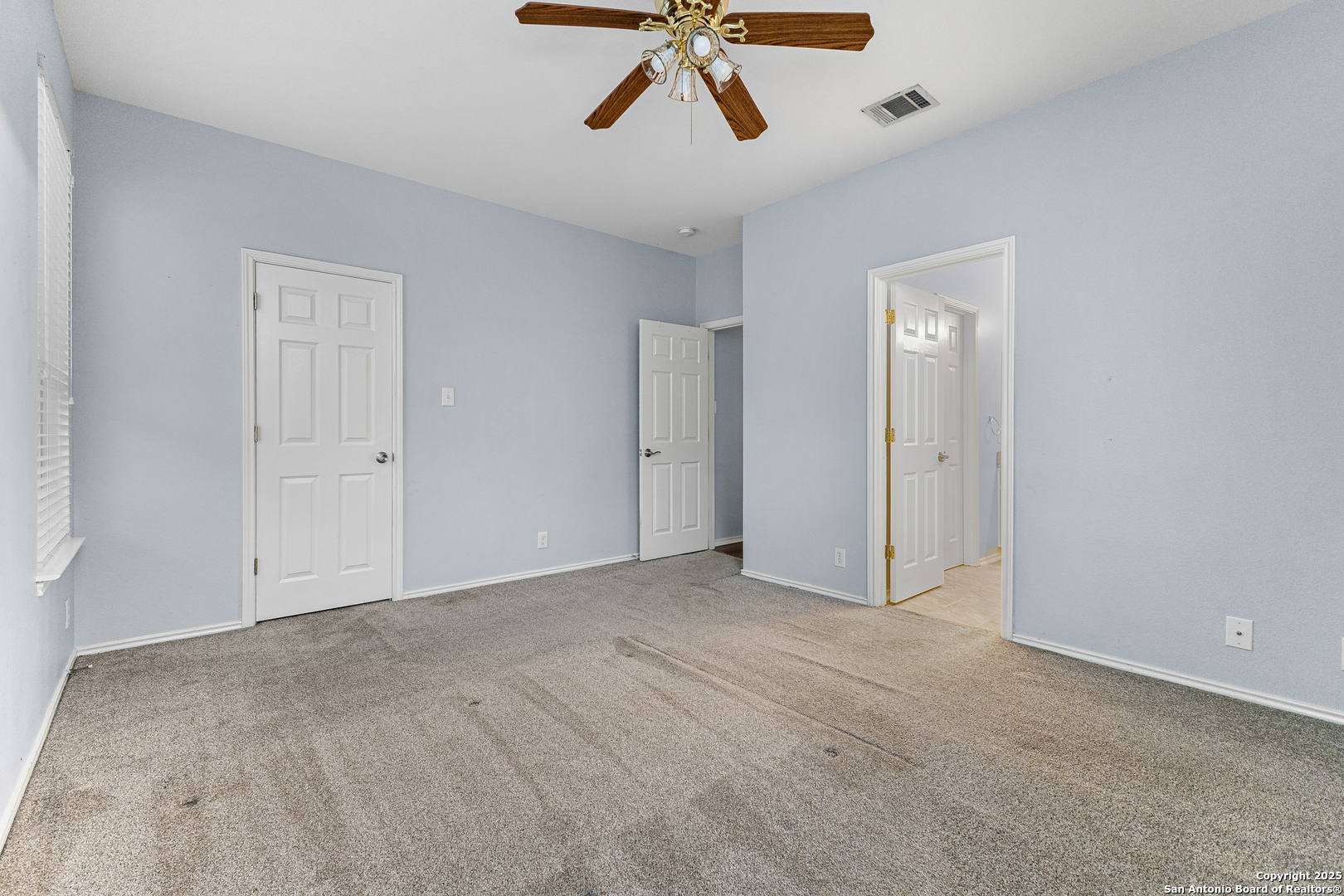 8522 Sonora Pass Helotes, TX 78023 - Photo 21 of 27 a view of empty room with ceiling fan