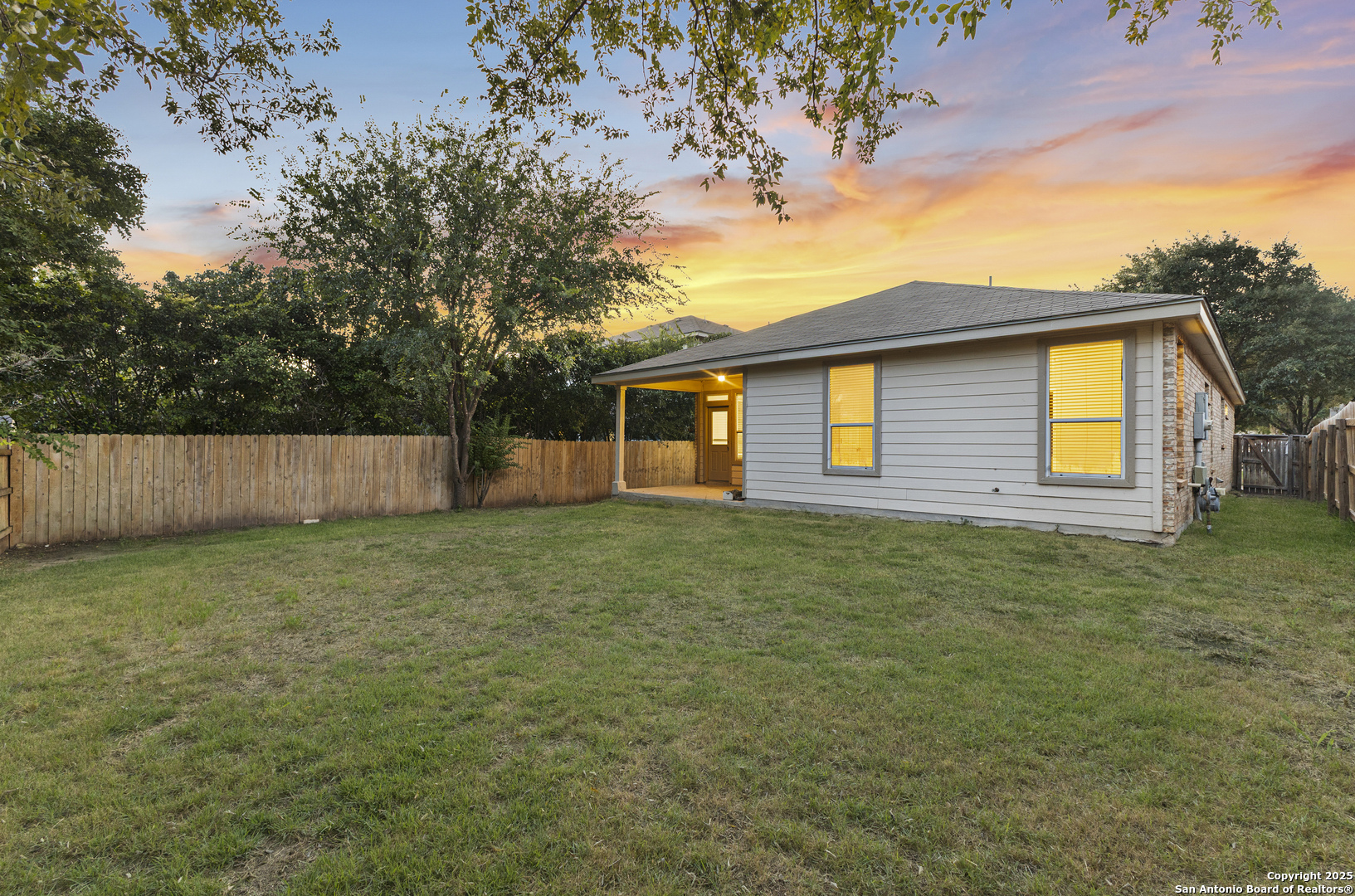 8522 Sonora Pass Helotes, TX 78023 - Photo 27 of 27 a view of a house with a yard