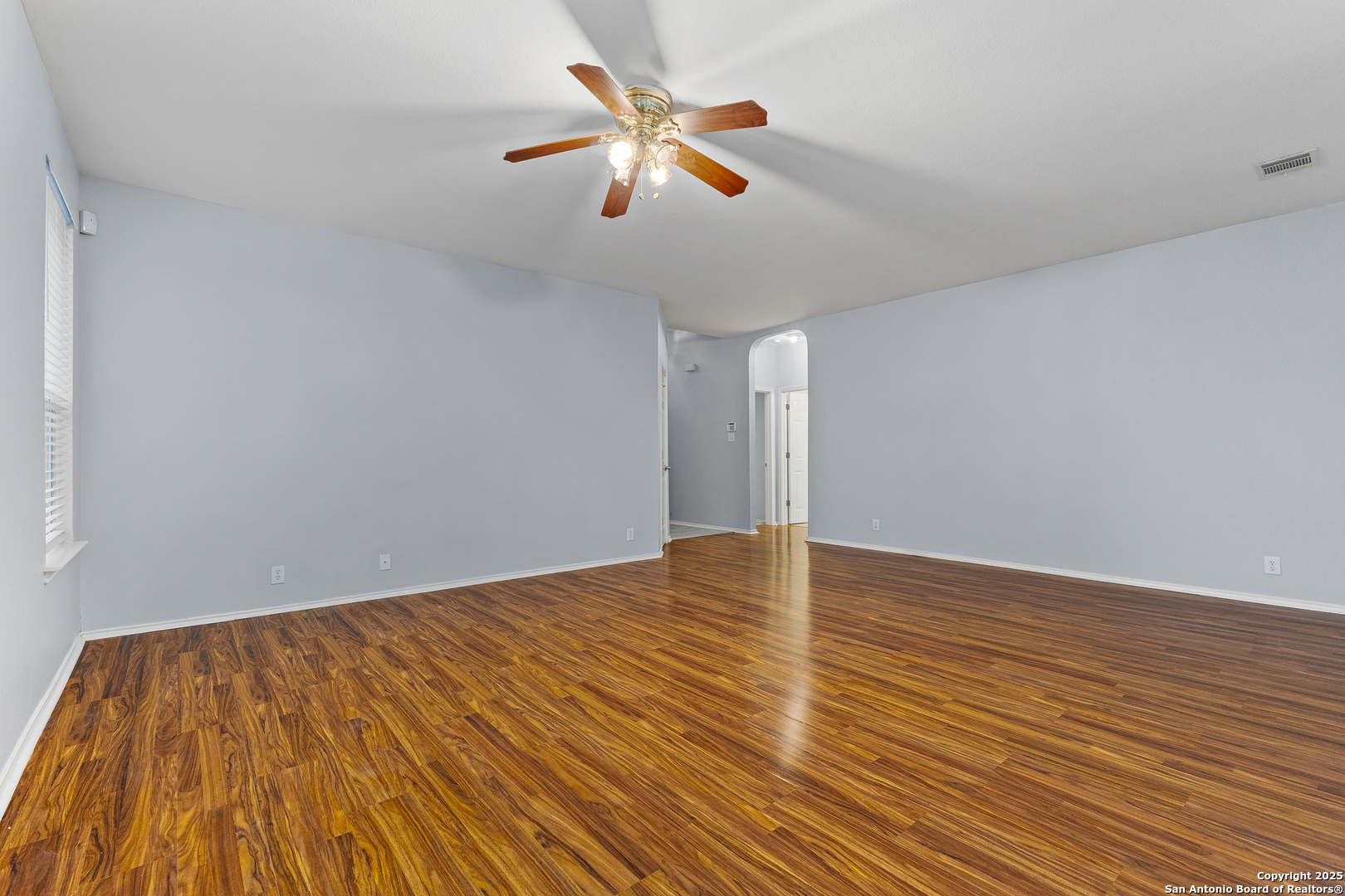 8522 Sonora Pass Helotes, TX 78023 - Photo 7 of 27 wooden floor in an empty room