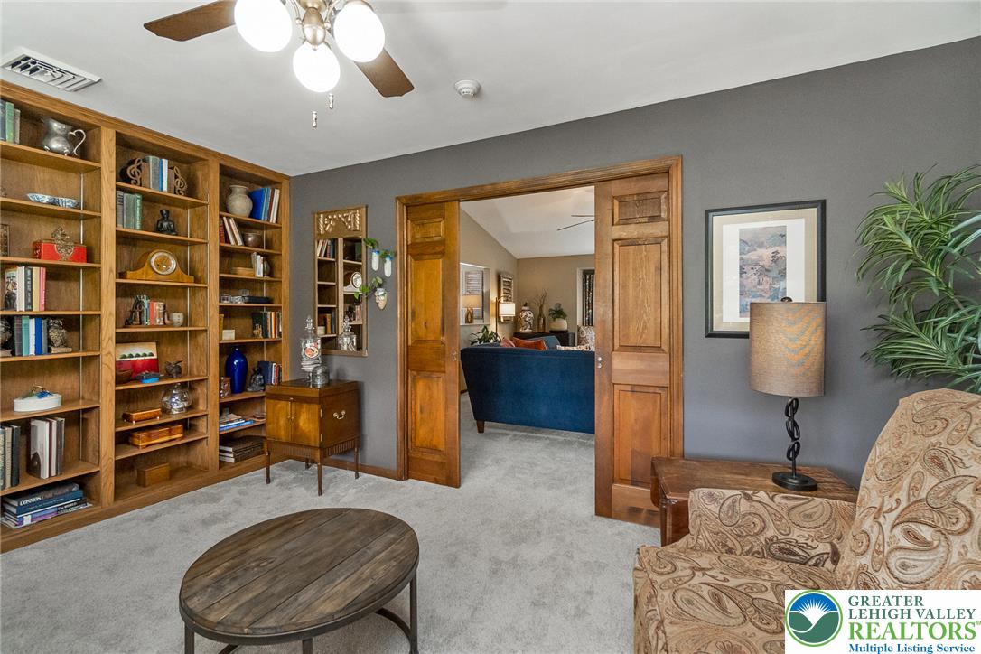 540 Briar Road Pen Argyl, PA 18072 - Photo 13 of 66 Built-in shelving and custom millwork create a refined study area.