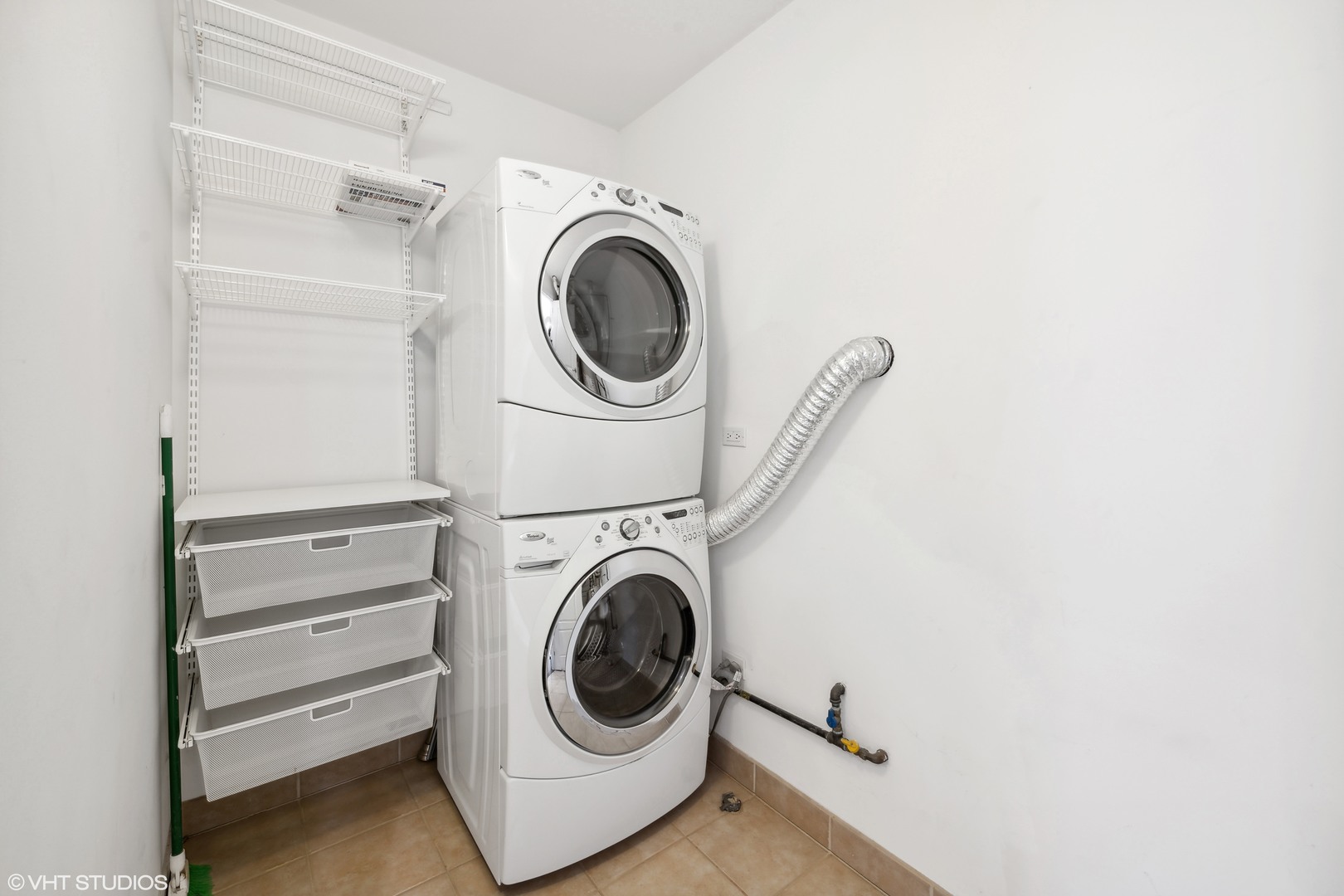 215 North Green Street, Unit 2 Chicago, IL 60607 - Photo 10 of 11 a utility room with dryer and washer