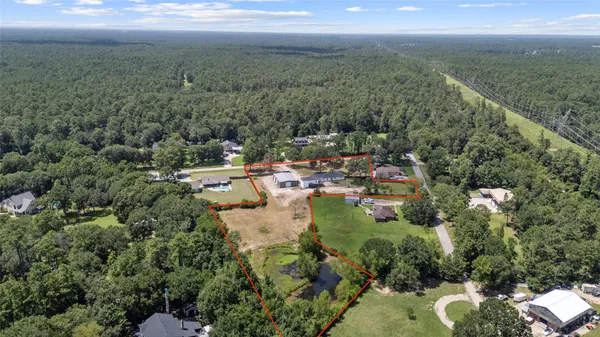 an aerial view of a house with a garden