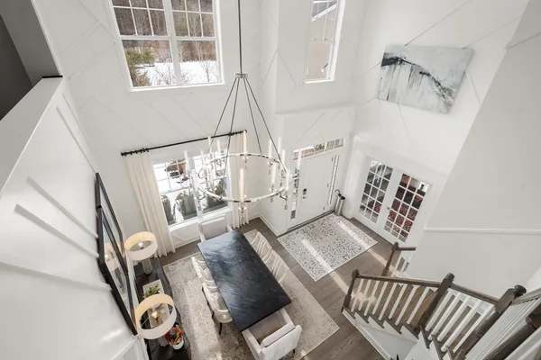 a view of living room with furniture and a window